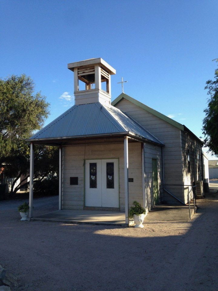 The Smoky Bay Community Church with original bell donated by the National Bank in the 1960s in their tower