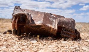 Over time and with the odd rainstorm, gems like this have been uncovered. This is a model tank, minus its turret, which shows scars of a nuclear test blast. After being checked by our atomic safety officer, it can be now be seen at One Tree blast sites.