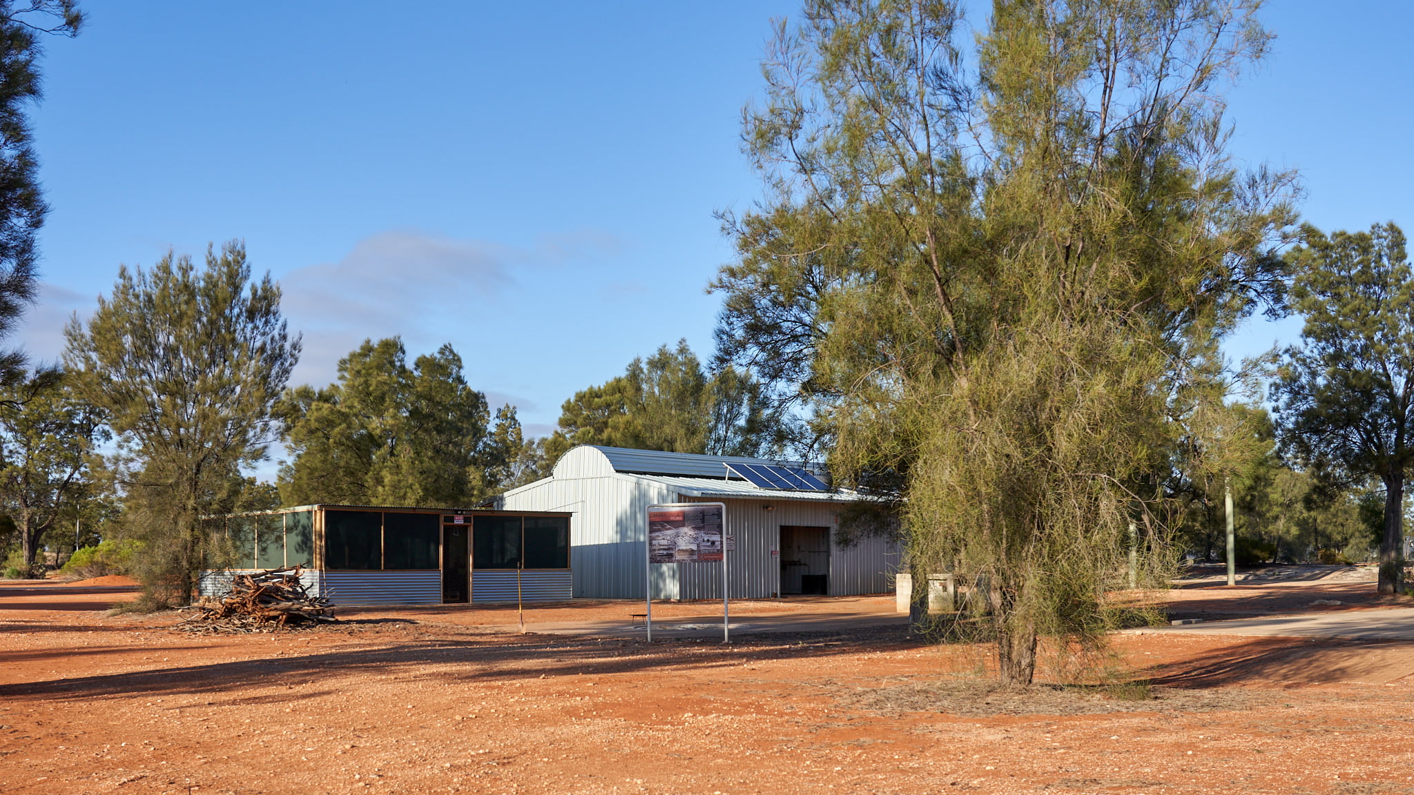 Fire ring and mail ablution block with camp kitchen